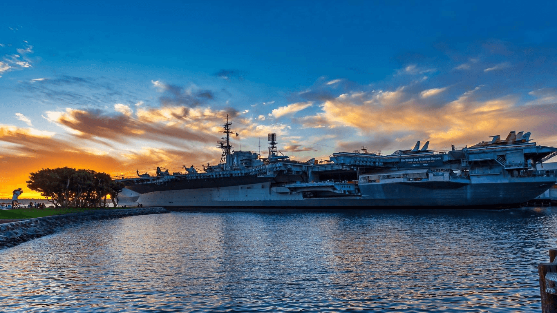 USS Midway Museum at sunset in San Diego Bay